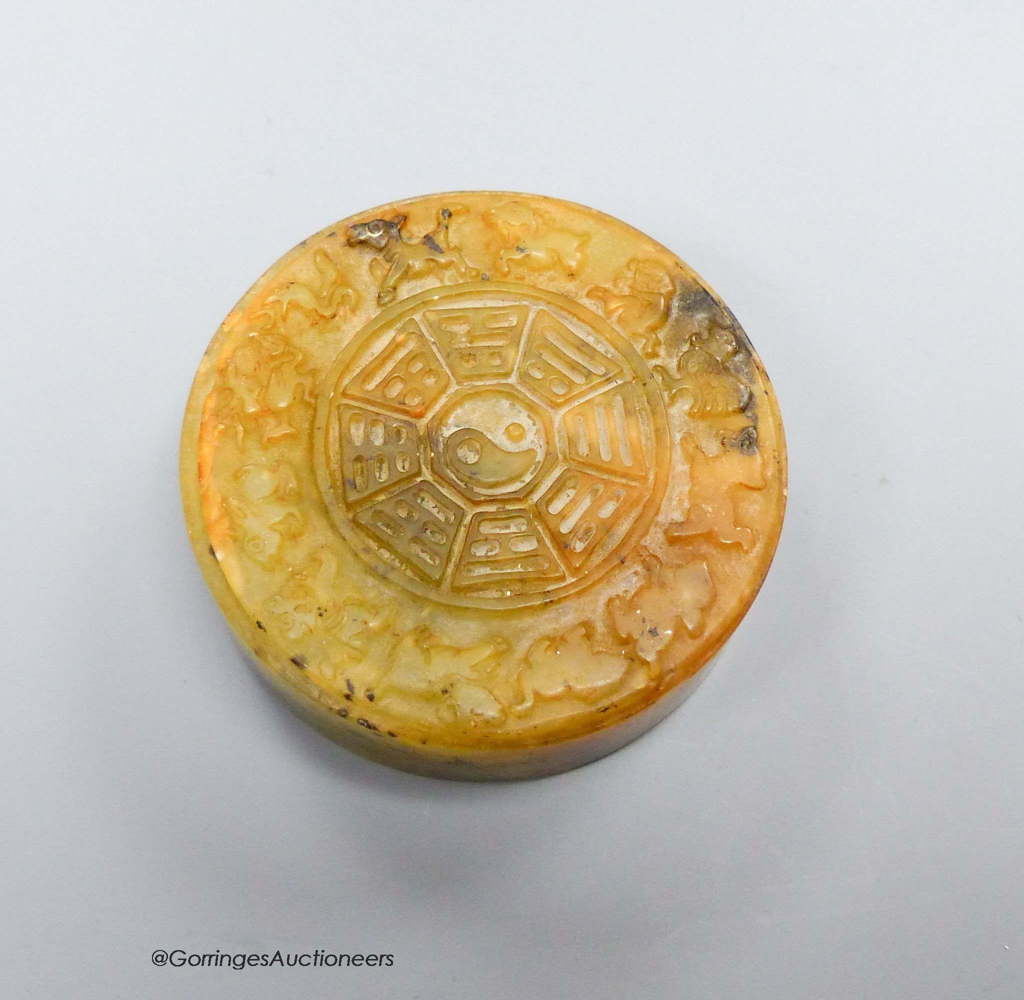 A Chinese soapstone seal disc